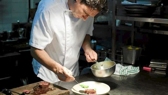 For discerning customers: Colin Fassnidge cooks a kangaroo dish at the Four in Hand Hotel in Paddington.
