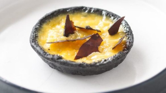 Vegemite, lychee and cheese charcoal tart at Nora, Carlton.