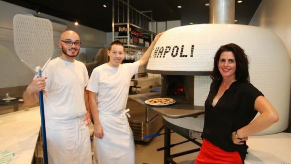 Pizzaioli Simone Percuoco (left) and Giordano Pini with Pizzeria Violetta owner Renata Roberts.