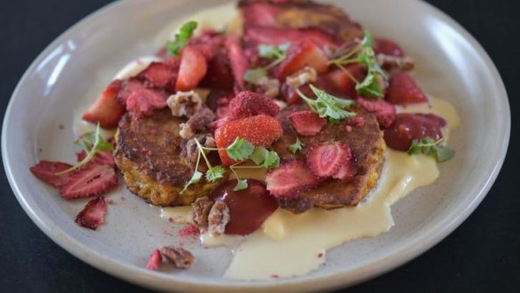Ricotta fritters with lavender custard, strawberries and pecan praline.