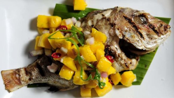 Baked whole baby snapper with mango Salsa from Kusina.