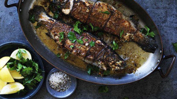 Whole stuffed trout with mushrooms and brown butter.