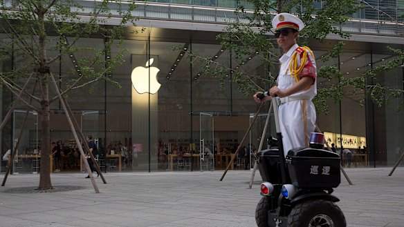 Security personnel and surveillance cameras are increasingly a way of life on Chinese streets,. 