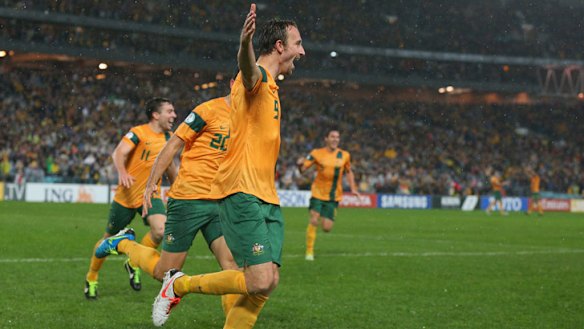 Josh Kennedy celebrates the sweetest of headed goals.