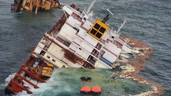 Alert over containers as ship's stern sinks