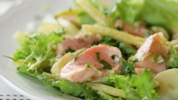 Poached salmon with salad leaves, potatoes and mayonnaise