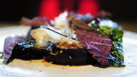Eggplant, smoked goat's curd, katsuobushi and sesame.