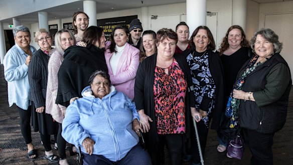 Indigenous writer Nakkiah Lui (in pink) with family and friends after seeing a performance of Blackie Blackie Brown: The Traditional Owner of Death at the STC Wharf Theatre.