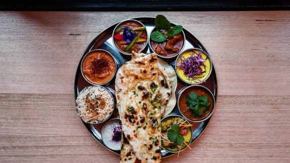 Thali tray of curries,
-Daughter-in-law- Jessi Singh opens his first Melbourne restaurant since 2017. 31st July 2019 The Age News Picture by JOE ARMAO