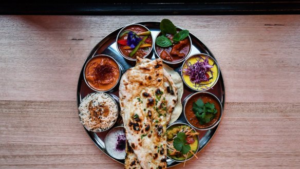 Thali tray of curries,
-Daughter-in-law- Jessi Singh opens his first Melbourne restaurant since 2017. 31st July 2019 The Age News Picture by JOE ARMAO