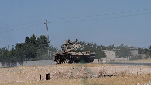 A Turkish tank on its way to the Syrian border.