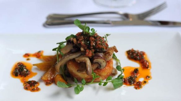 Golden beetroot, sauteed wild mushrooms, millet and parmesan cake, sauce bois boudran.