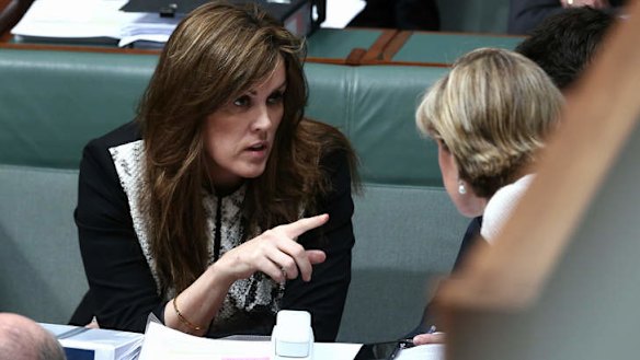 Peta Credlin, chief of staff to the Prime Minister, and Foreign Affairs Minister Julie Bishop in discussion during QT. Photo: Alex Ellinghausen