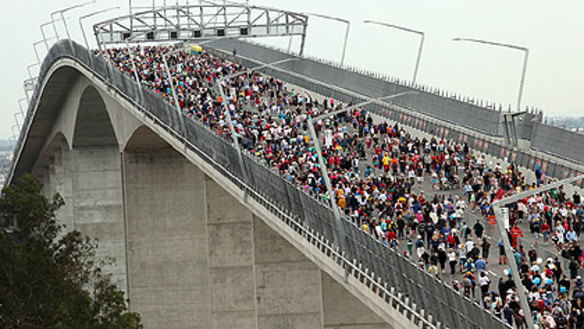 An estimated 170,000 people walked across the new Gateway Bridge on Sunday.