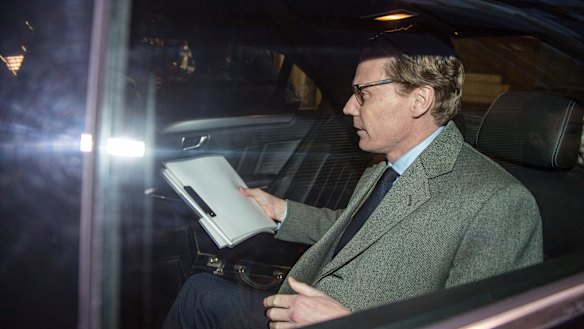 Alexander Nix, chief executive officer of Cambridge Analytica, leaves the company's offices in London.