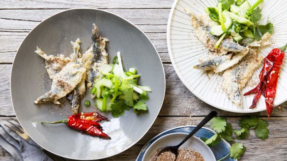 Fried sardines with five-spice salt and pickled cucumber.