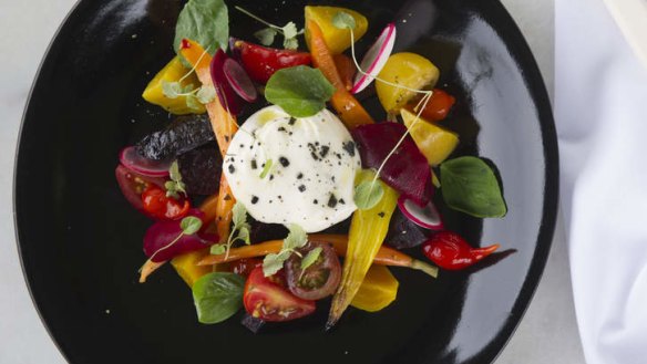 Summer salad, burrata, pickled and roasted carrots, beets, kiss peppers and black salt.