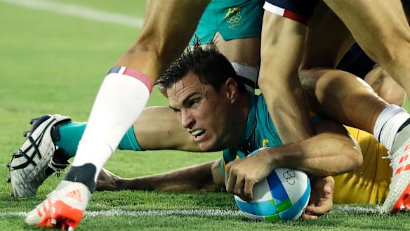 Caught in the ticketgate: Ed Jenkins scoring a try in the men's rugby sevens match against France in Rio.