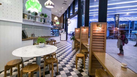 Long and narrow: Inside the Collins Square cafe.