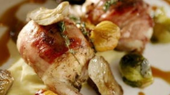 Oven roasted quail with bread stuffing, new-season vegetables and toasted