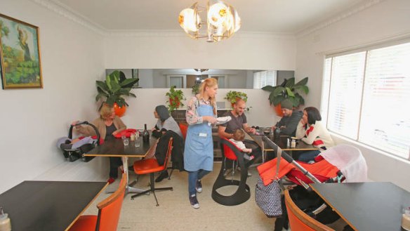 Step-up dining rooms feature funky space-age light fittings.