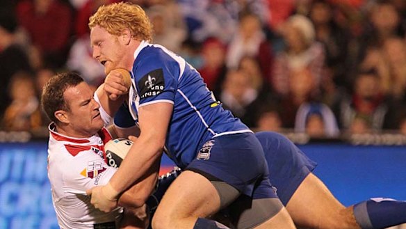 Nowhere to go ... Dean Young is monstered by James Graham.