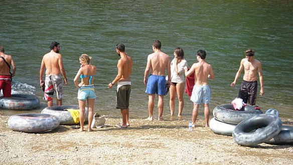 Tourists prepare to go tubing in Vang Vieng.