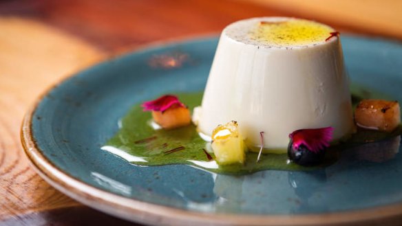 Spiced panna cotta with cubes of pineapple and watermelon.