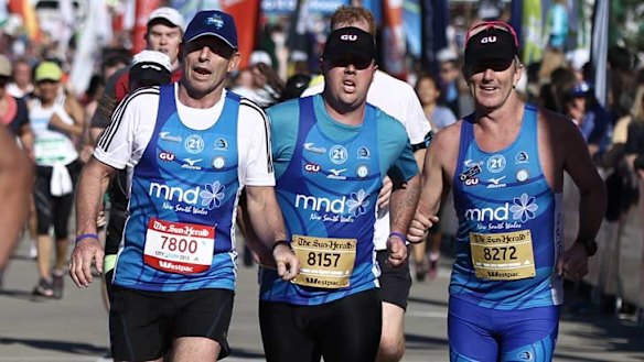Line honours ... Opposition Leader Tony Abbott at the end of the City2Surf.