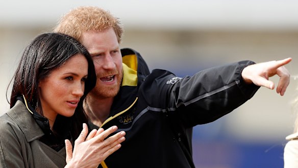 Britain's Prince Harry and his fiancee Meghan Markle attend the UK team trials for the Invictus Games in Sydney at the University of Bath in Bath, England.