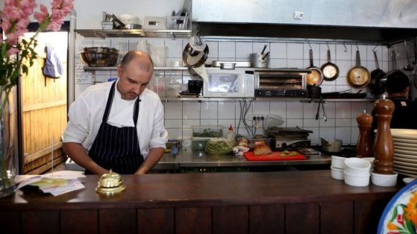 New fit-out: A rustic kauri counter is repurposed from the former deli.