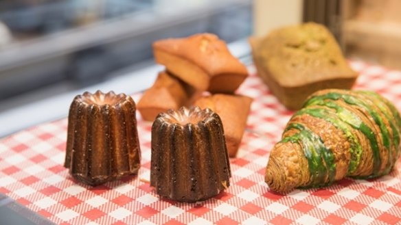 Pastries including caneles (left) and pandan croissants at Agathe Patisserie Petite.