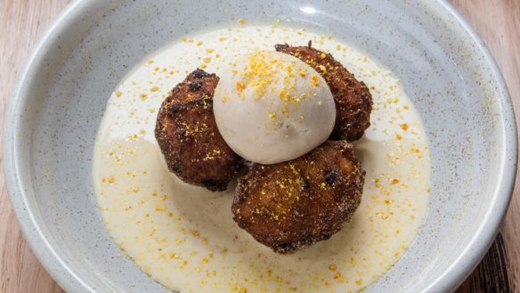 Fritole - raisin doughnuts with custard.