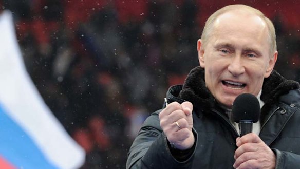 Putin evokes foreign threats in election battle cry