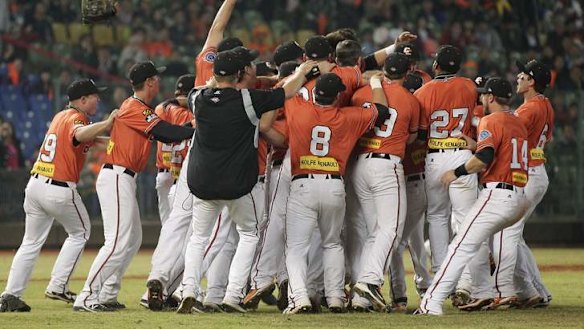 Australia's Canberra Cavalry players celebrate after defeating Taiwan's Uni-President 7-Eleven Lions 14-4.