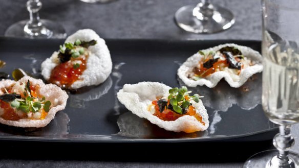 Crisp and decadent ... Prawn crackers with salmon roe, nashi and roasted chilli.