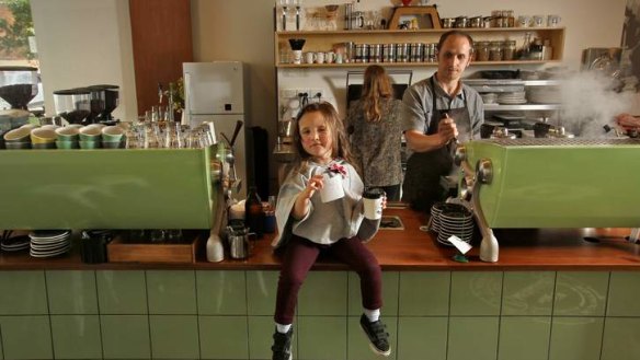 Shane Farrell does not open his city cafe League of Honest Coffee on Sundays. He is pictured with daughter Tilly.