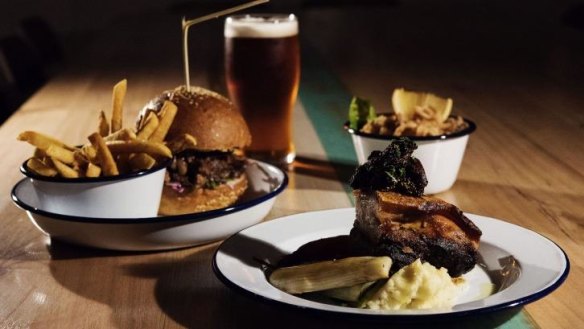 Relaxed fare: A pulled pork burger, fried baby squid and spiced pork belly at The Public in Cammeray.