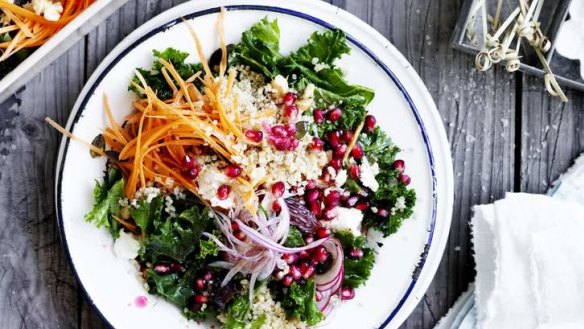 Massaged kale salad with quinoa, date and pomegranate.