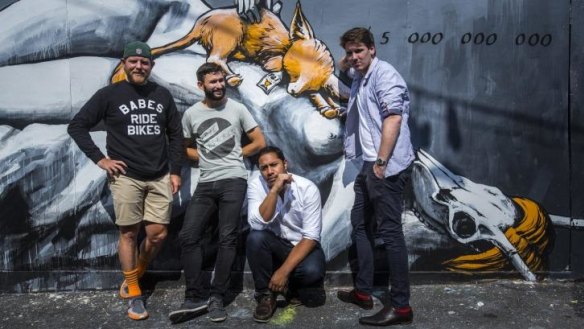 Casey Wall, Michael Bascetta, Manu Potoi and Banjo Harris Plane outside Bar Liberty.