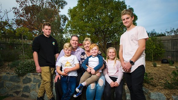 Mitchell, 16, Blake, 6, Mark, Monica, Kai Henry, 3, Adison ,9, and Josh, 16. 