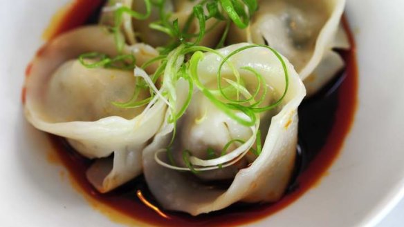 Prawn and pork dumplings with spicy soy vinaigrette.
