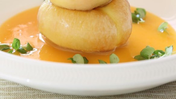 Doughnut peaches with Amaretto sauce and baby basil.