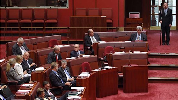 Assistant Health Minister Senator Fiona Nash sits with colleague Senator Eric Abetz in the Senate during the vote to suspend standing orders on Wednesday.