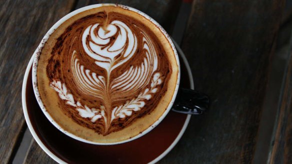 The coffee displays an impressively complex rosetta.