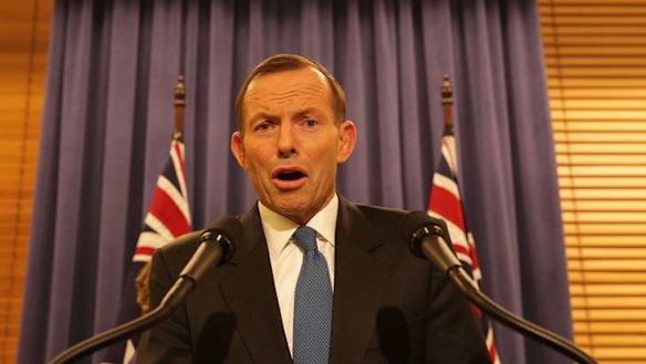 Opposition Leader Tony Abbott addresses the media late on Wednesday night.
