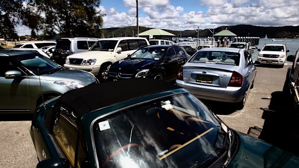 Cars that ate Palmy: a packed car park near the Pittwater Park Wharf.