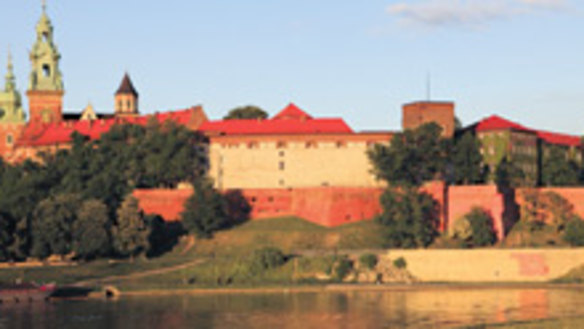 Gothic charm ... the cathedral and castle atop Wawel Hill; (right) the Market Square.