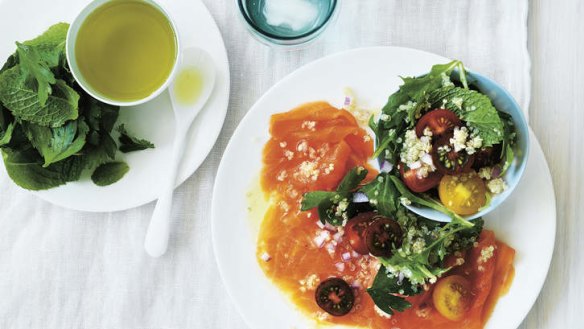 Smoked ocean trout with quinoa and tomato salad.