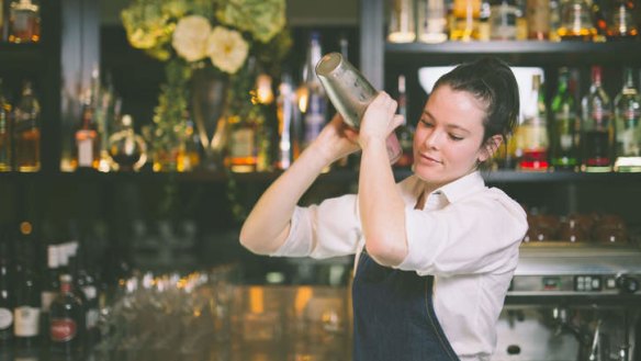 Bartender Sophie Harkin mixes a cocktail.
